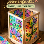 Un enfant concentré en train de réaliser un projet DIY coloré avec des matériaux sûrs.
