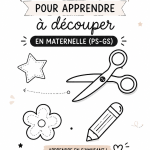 Un enfant utilisant des ciseaux pour découper un modèle coloré en classe de Maternelle.