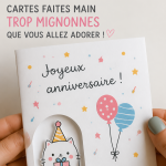 Idées de cartes d'anniversaire DIY présentées sur une table avec des fournitures créatives.